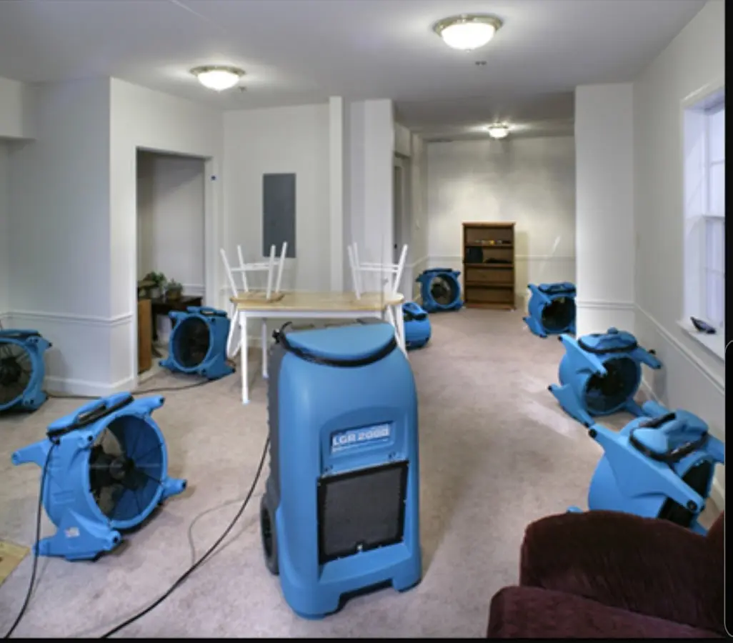 Air movers and dehumidifier setup for Water Damage Restoration in Floris